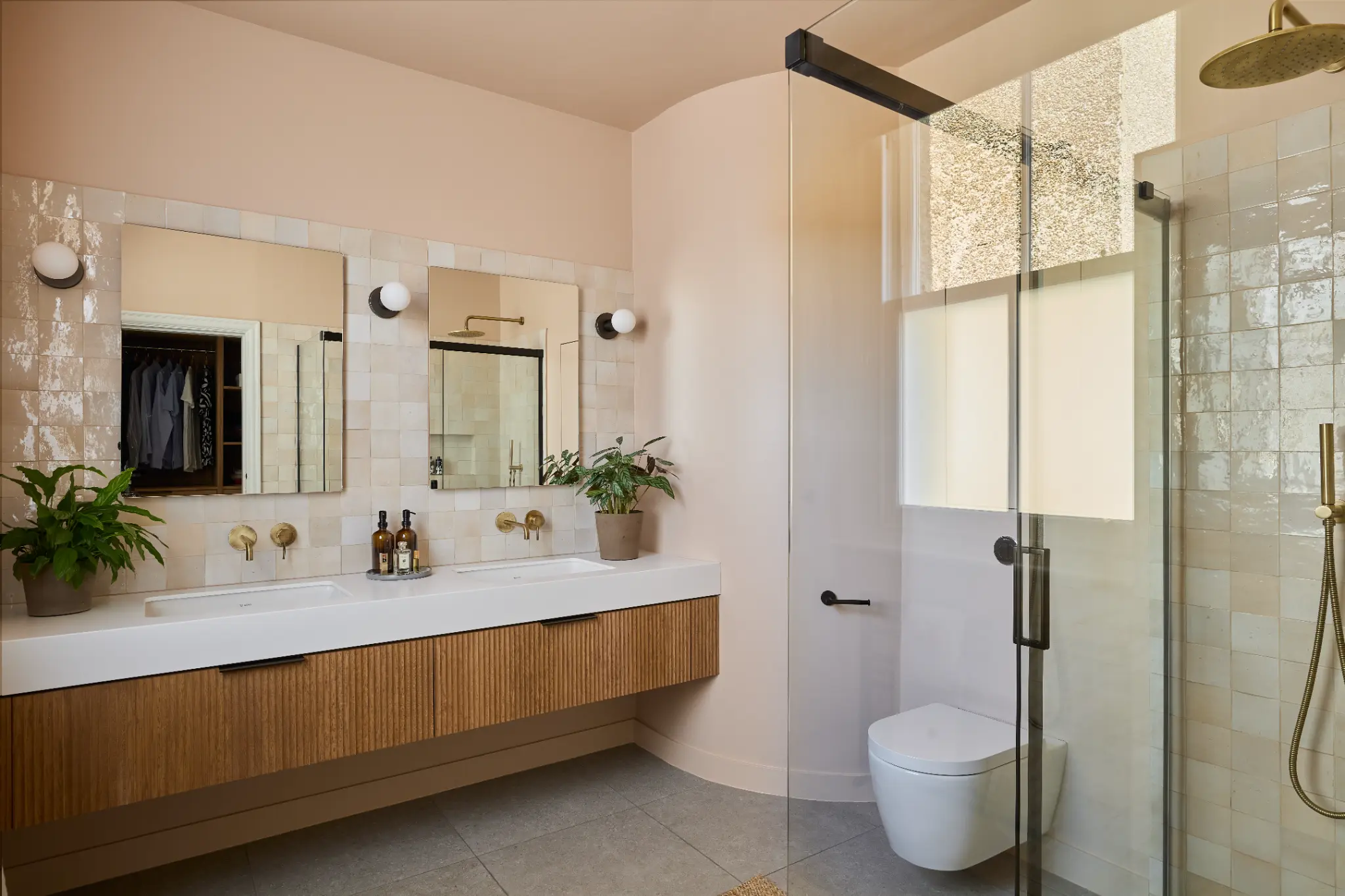 Bathroom with natural elements and potted plant for low-VOC finishes